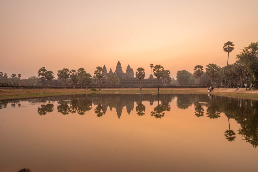 Angkor Wat sunrise reflection pool Cambodia budget travel guide